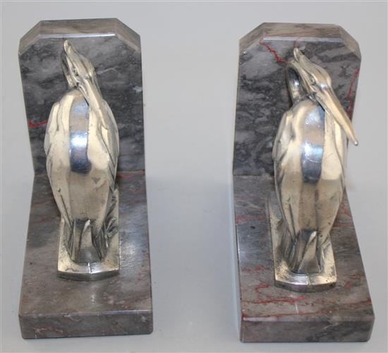 A pair of heron bookends & pair toucan bookends